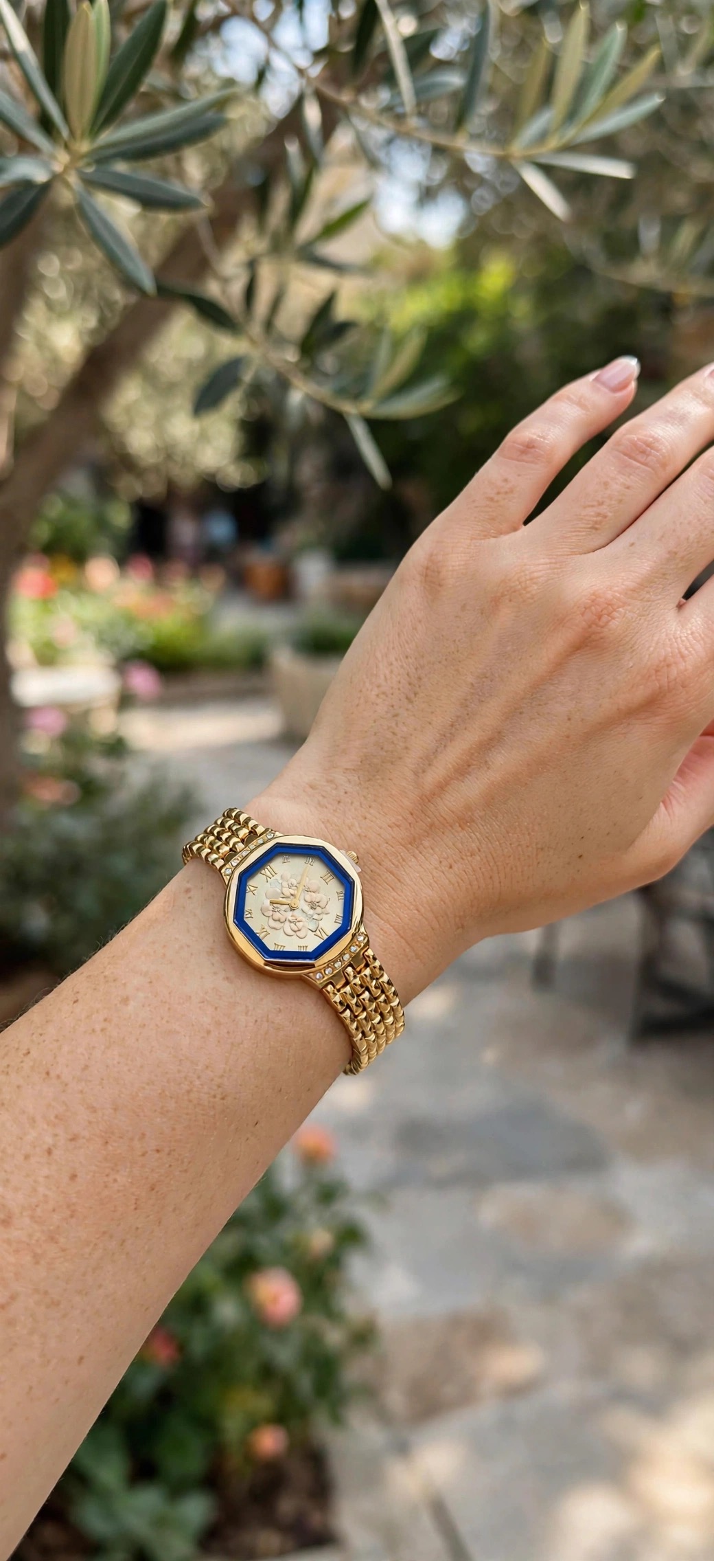 Octagonal floral gold watch